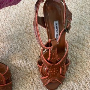 Brownish tan leather with coral design trim! One of a kind